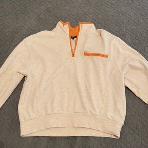Beige and orange quarter zip jacket